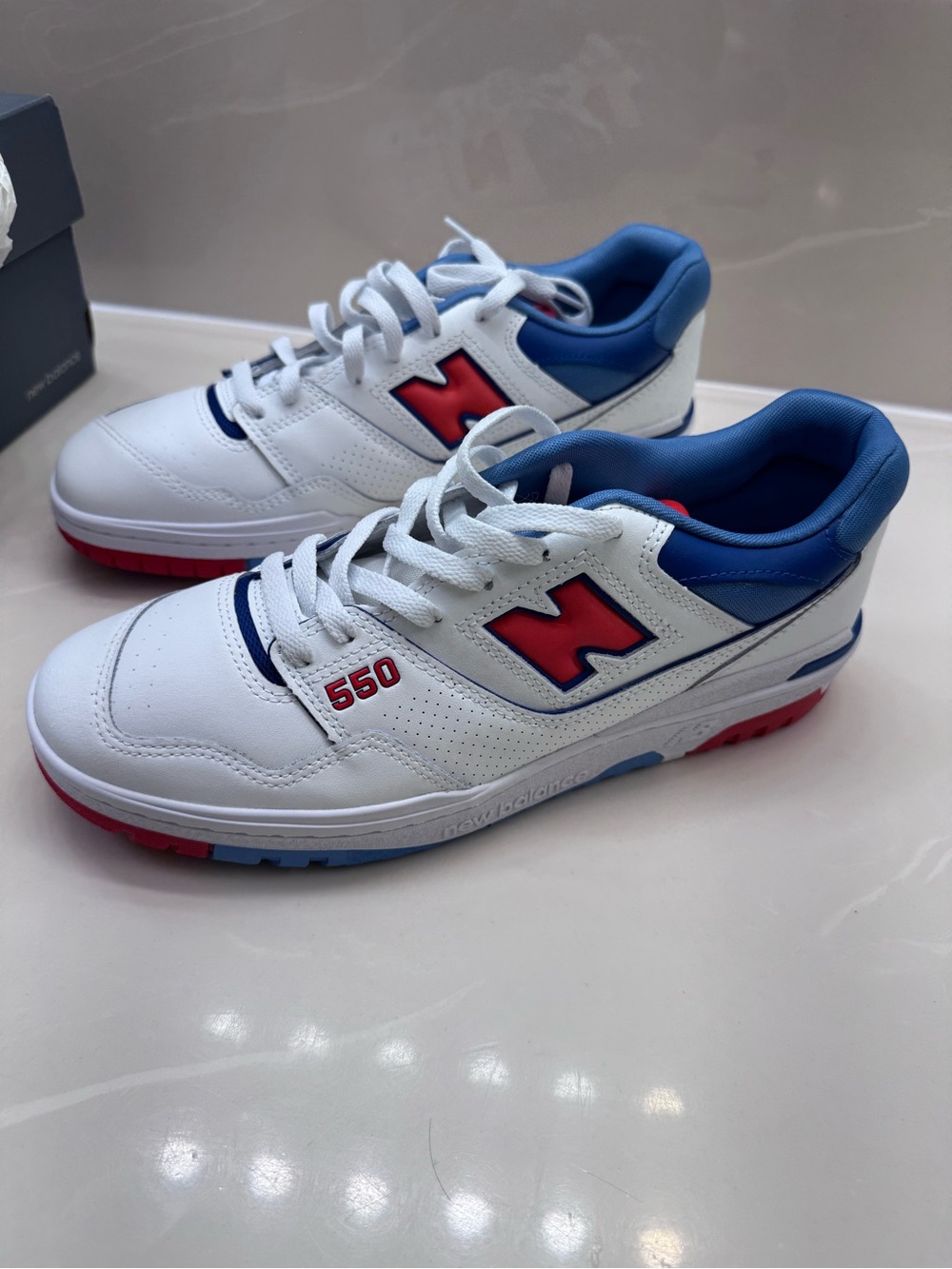 New Balance Men’s 550 Sneakers in White, Blue & Red